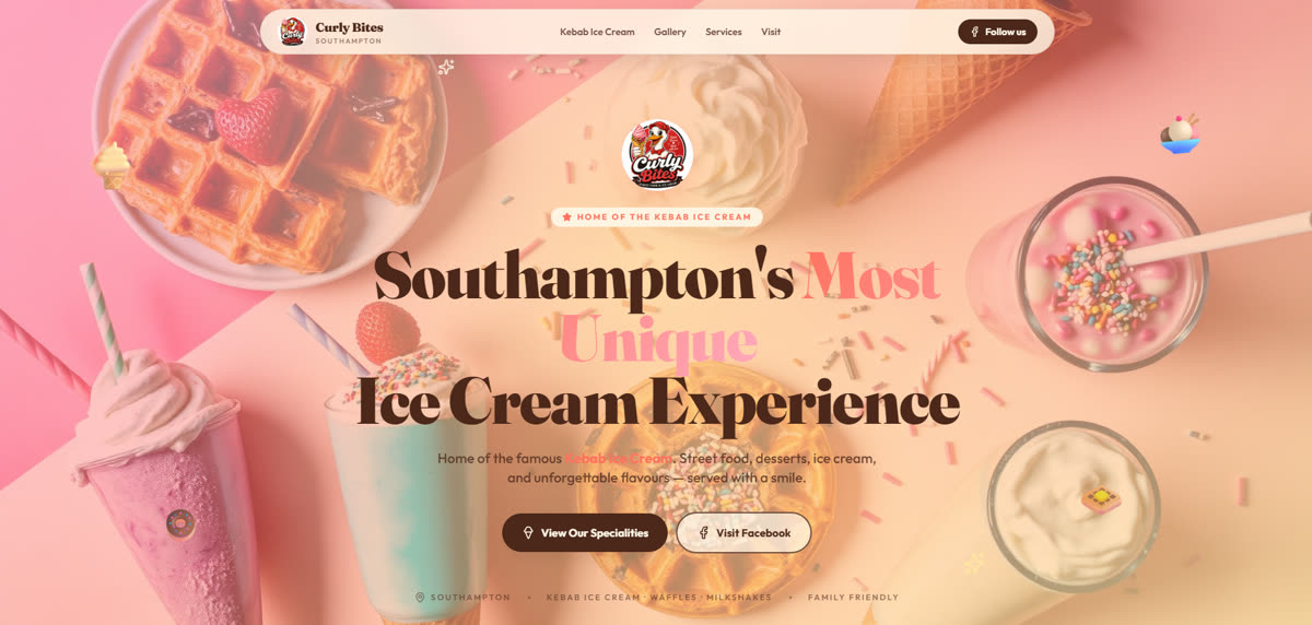Curly Bites homepage showing waffles, milkshakes and ice cream on a pink background